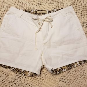 Womens white shorts trimmed in tans/browns